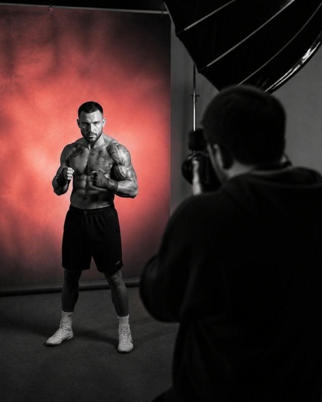 A fighter at a sponsor photo shoot